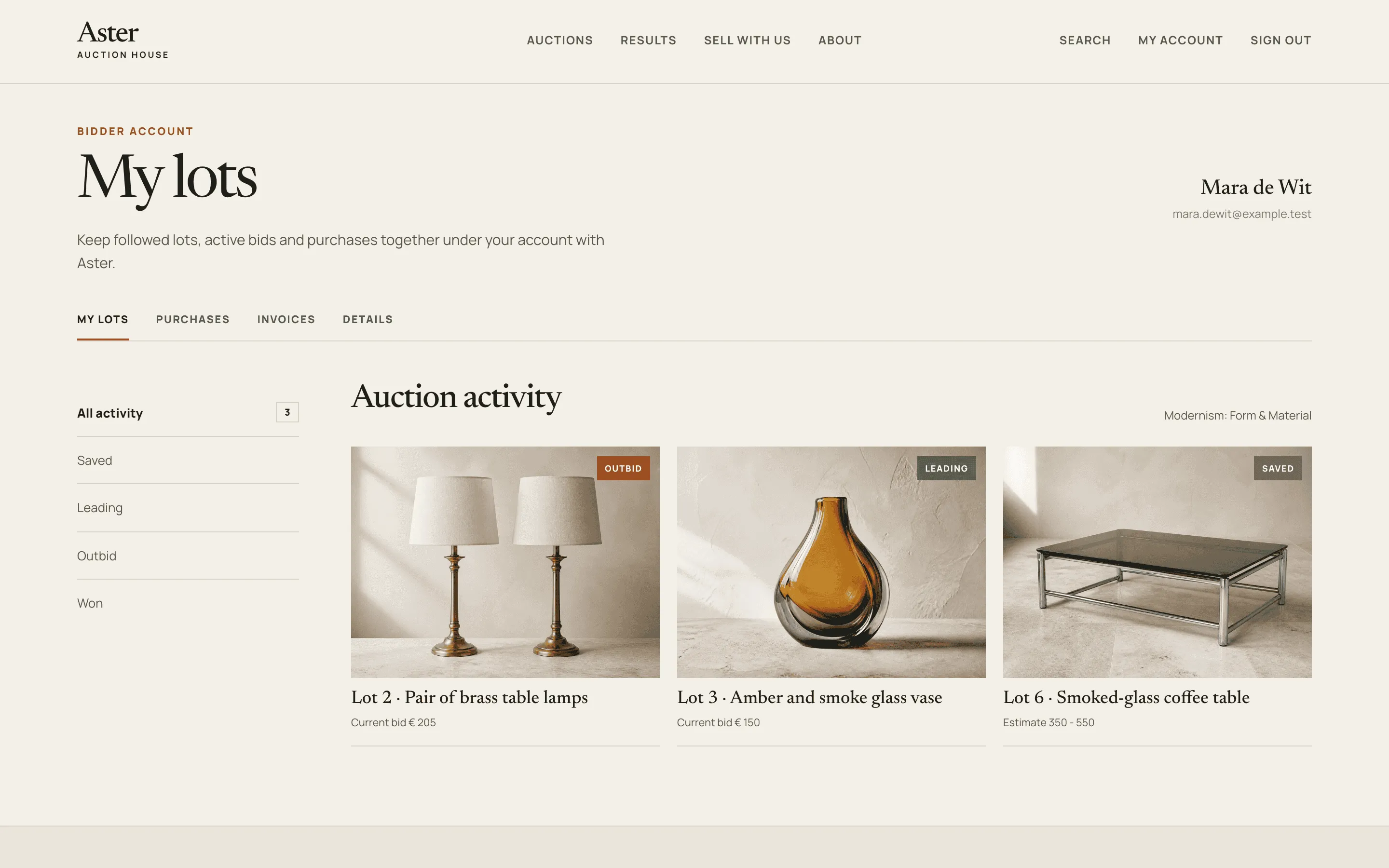The bidder account showing a leading bid, an outbid lot and a saved lot